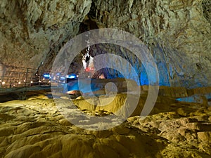 The interior of Stopica cave with tufa bathtubs illuminated with colored light, is located on the slopes of the Zlatibor mountain
