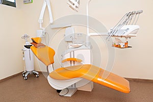 Interior stylish modern dentist office in orange style