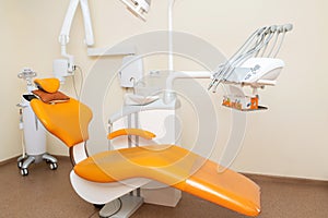 Interior stylish modern dentist office in orange style