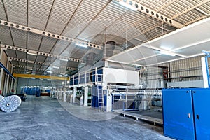 Interior of Textile factory with automated machinery.Concept of Industry and Technology.