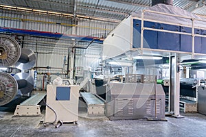 Interior of Textile factory with automated machinery.Concept of Industry and Technology.