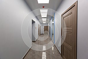 Interior of typical office - empty corridor - without furniture after construction,overhaul, remodeling, rebuilding