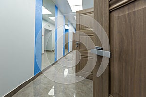 Interior of typical office - empty corridor - without furniture after construction,overhaul, remodeling, rebuilding