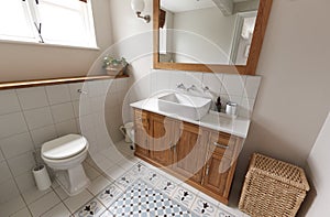 Interior View Of Beautiful Bathroom With Wash Basin And WC  In Family Home