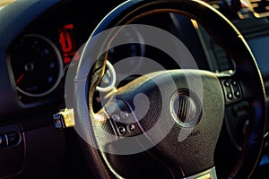 Interior view of car with black sport car