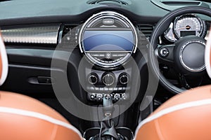 Interior view of car. Modern technology car dashboard, radio and