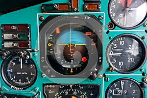 Interior view of a control panel of a vintage airplane with dashboard