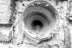 Interior view of dryer vent line with lint and dust buildup