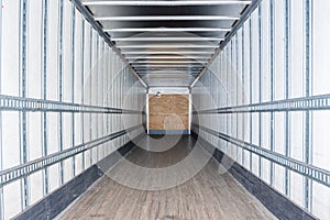 Interior view of empty semi truck dry van trailer