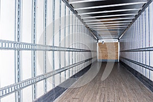 Interior view of empty semi truck dry van trailer