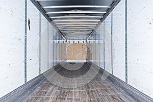 Interior view of empty semi truck dry van trailer