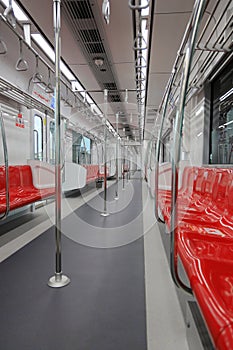 An interior view of empty suburb Red Line Mass Transit System