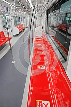 interior view of empty suburb Red Line Mass Transit System