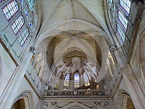 Gothic architecture with vaulted ceilings and stained glass photo