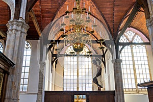 Interior view of historic Oude Kirk (church) windows, in Amsterdam city, The Netherlands