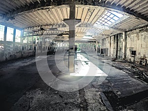 Interior view of industrial ruins in the old communist prison