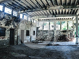 Interior view of industrial ruins in the old communist prison