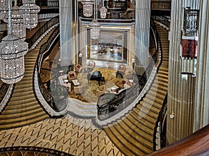 Interior view of a luxurious hotel, modern light chandelier in the hall