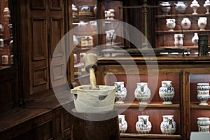 Interior view of an old pharmacy with Bottles on the shelf