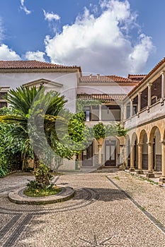 Interior view of the University of Coimbra , law department building, Melos Palace, with garden and vernacular cloister photo