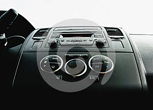 Interior view of vehicle. Modern technology car dashboard close up. Climate