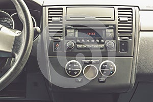 Interior view of vehicle. Modern technology car dashboard close up. Climate