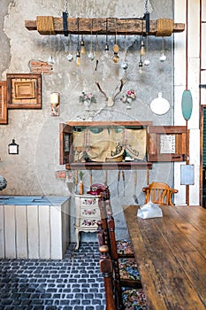 interior of a Vintage Dining Room with decorative objects and furniture.