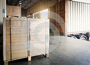 Interior of warehouse dock, Large pallet shipment boxes waiting to load into container truck