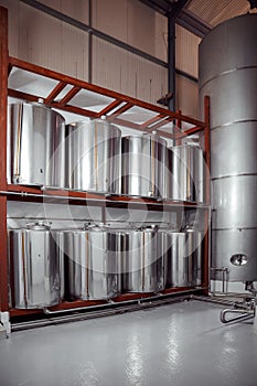 the interior of the warehouse for storage of olive oil in stainless steel tanks