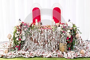 Interior of a wedding tent decoration ready for guests. Served round banquet table outdoor in marquee decorated flowers