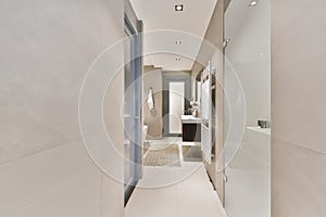 Interior of white modern bathroom in apartment