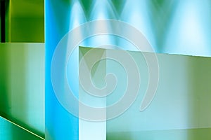 Interior white walls light painted in blue and green/abstract geometrical background