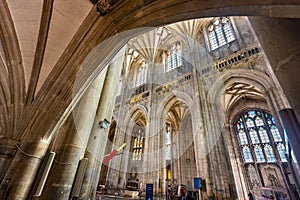 Interior of Winchester Cathedral,framed by an archway.