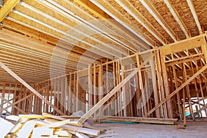 Interior with wood framing beam of new house under construction beam wood