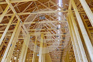 Interior with wood framing beam of new house under construction beam wood