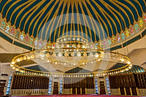 Interiors with big lamp on the roof of  in King Abdullah I Mosque in Amman, Jordan, built in 1989 by late King Hussein in honor of