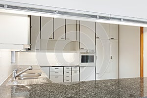 Interiors of empty apartment, kitchen