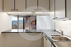 Interiors of empty apartment, kitchen