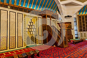 Interiors with red Arabic traditional carpet in King Abdullah I Mosque in Amman, Jordan, built in 1989 by late King Hussein in