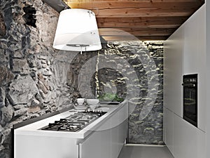 interiors shots of a modern kitchen furniture in the rustic room with wooden ceiling and stone walls