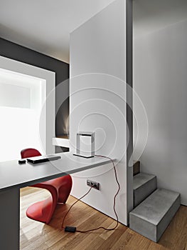 Interiors shots of a modern workplace with a modern writing desk