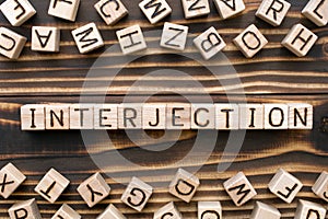 interjection - word from wooden blocks with letters