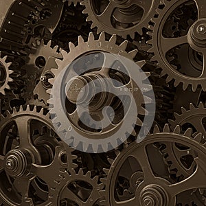 Interlocking bronze-colored gears and cogs in a complex mechanical assembly. The
