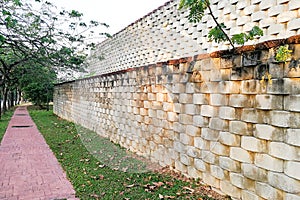 Interlocking designed retaining wall to manage earth erosion