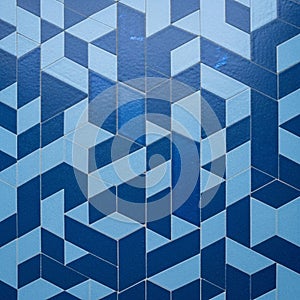 Interlocking hexagonal shapes in various shades of blue, creating