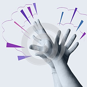 Interlocking human hands with a painted splash of fingers. Hand gestures expressing emotions, magic of hands