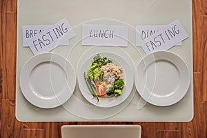 Intermittent fasting during breakfast and dinner. Intermittent fasting concept, top view