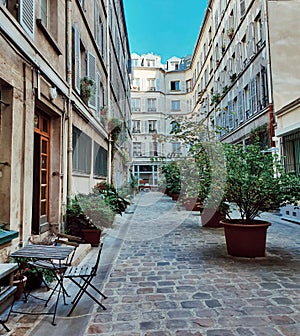 Intern court of a parisian buliding in the center of Paris, haussmannian architecture style, Paris, France photo