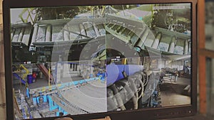 Internal cameras for factory security. Multiscreen shows video from CCTV. Cameras installed in the factory