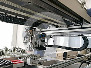 Inside electronic pick and place machine for PCB assembly